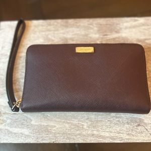 Kate Spade wallet with wrist strap, 5 compartments.